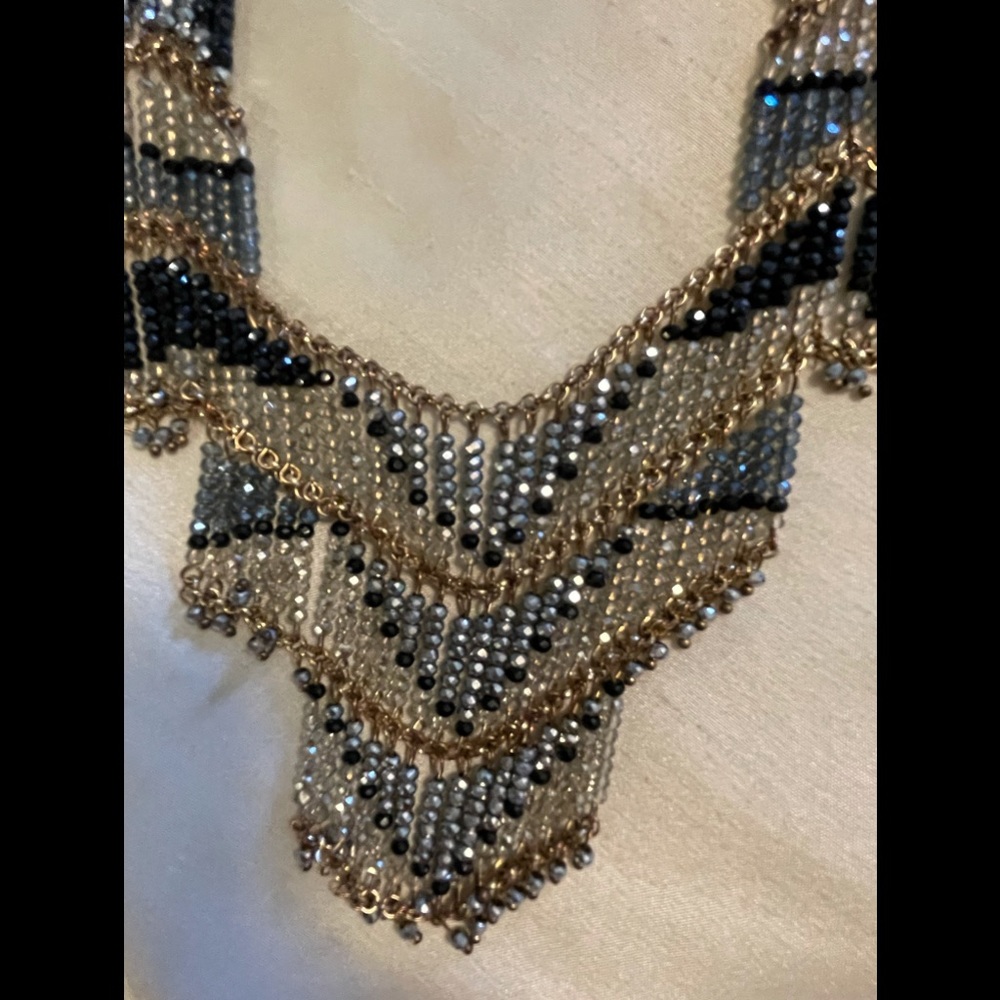 Women’s blue and gold costume jewelry necklace
